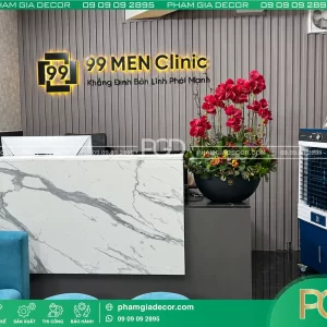 Backdrop quầy lễ tân 99 MEN Clinic đẹp tại tphcm